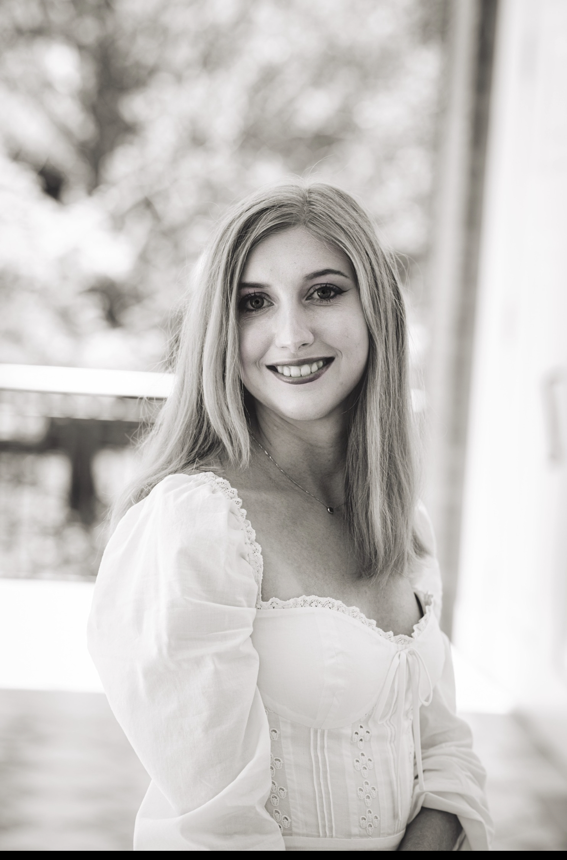 Julia Fink, assistant, a black and white photo